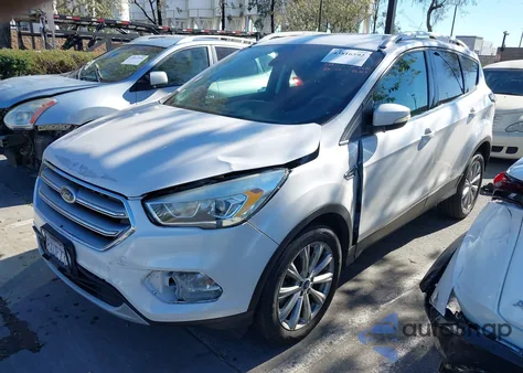 2017 Ford Escape Titanium из США, поврежденный, VIN 1FMCU0J93HUE73857